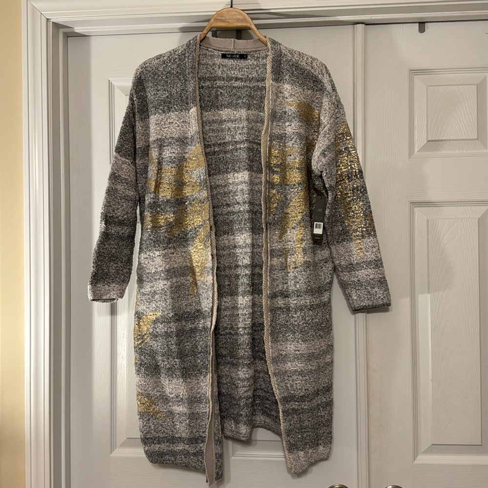Long sweater with metallic accents. Nic and Zoe